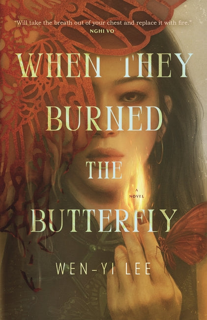 Paperback copy of "When They Burned the Butterfly" by Tor Books, featuring its cover art with a butterfly motif.