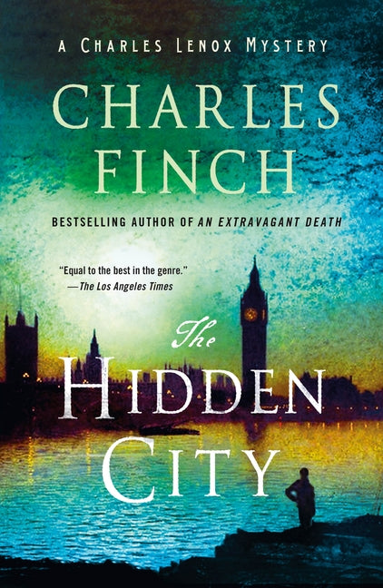Paperback copy of "The Hidden City: A Charles Lenox Mystery" by Minotaur Books, showing the book cover with title and author.