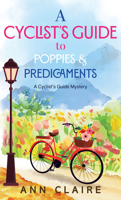 Paperback book titled "A Cyclist's Guide to Poppies & Predicaments" by Thorndike Press Large Print, featuring a colorful cover image.