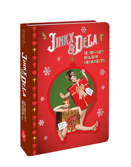 Paperback Jinkx & Dela 12 Pop-Out Holiday Ornaments book with colorful cover featuring festive holiday design.