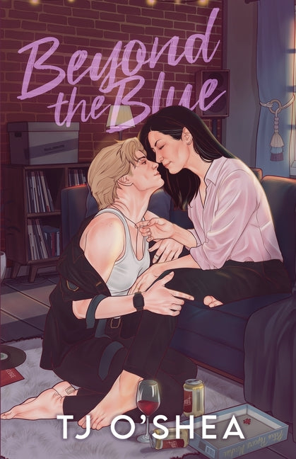 Paperback of Beyond the Blue by Tj O, a sapphic age gap romance novel with a colorful cover featuring ocean and sky imagery.