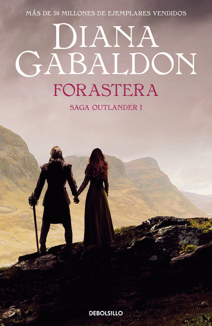 Paperback of Outlander by Debolsillo featuring the book cover with the title and author’s name on the front.