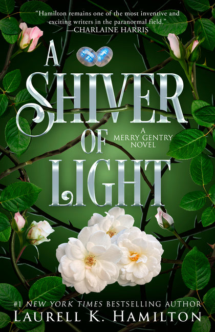 Paperback copy of "A Shiver of Light" by Berkley Books, showing the book cover with dark, mystical artwork.