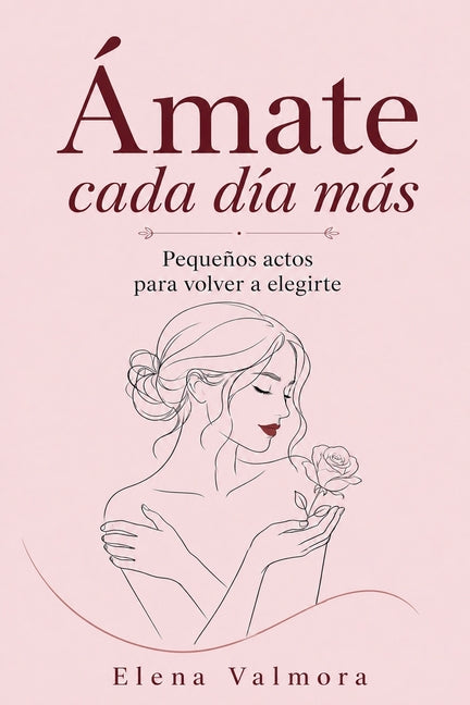 Paperback copy of Ámate Cada Día Más by Elena Valmora, featuring a colorful cover with floral and heart illustrations.
