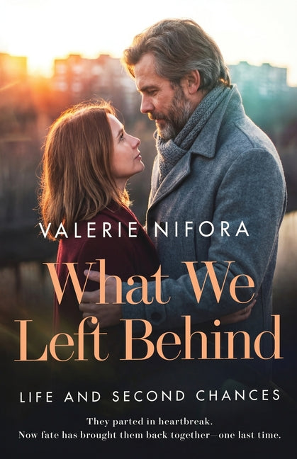 Paperback copy of "What We Left Behind" by Author Academy Elite, featuring the book's cover with title and design elements.