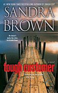 Open book titled "Tough Customer" published by SureShot Books Publishing LLC, featuring bold cover design and clear text.