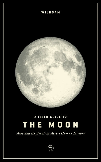 Paperback "A Field Guide to the Moon" by Wildsam with a cover featuring lunar illustrations and detailed moon phases.
