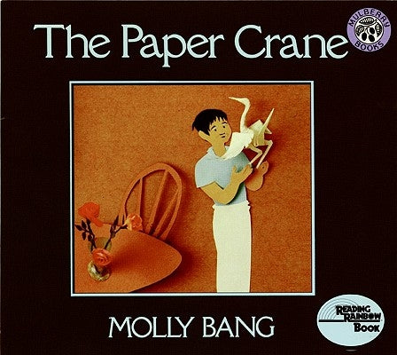 Paperback copy of "The Paper Crane" by Greenwillow Books featuring a colorful cover illustration.