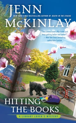 Mass market paperback book titled "Hitting the Books" by Berkley Books, featuring a colorful cover with books and academic themes.