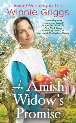 Amish Widow's Promise mass market paperback novel by Forever, featuring a serene Amish countryside scene on the cover.
