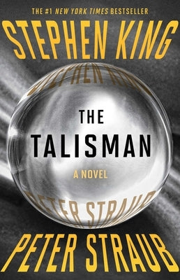 Paperback of The Talisman by Scribner Book Company featuring the book cover with mystical design and title text.