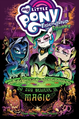 Paperback of My Little Pony: Friendship Is Spooky comic book by IDW Publishing featuring colorful pony characters on the cover.
