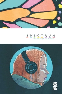 Paperback comic book titled Spectrum by Mad Cave Studios featuring vibrant cover art and dynamic illustrations.