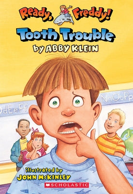 Paperback of Tooth Trouble from Ready, Freddy! #1 series by Blue Sky Press, featuring colorful cover art and a smiling cartoon boy.