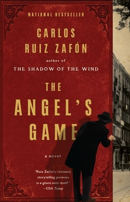 Paperback of The Angel's Game psychological thriller by Vintage, showing the front cover with dark, artistic design.