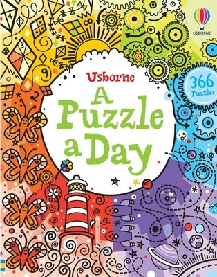 Paperback Puzzle a Day book by Usborne Books featuring colorful illustrations and daily brain-teasing puzzles.