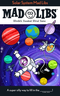 Open paperback of Solar System Mad Libs by Mad Libs, featuring colorful space-themed illustrations on the cover.