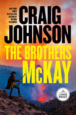Paperback copy of The Brothers McKay: A Longmire Mystery by Random House Large Print Publishing, featuring a book cover with artwork and title.