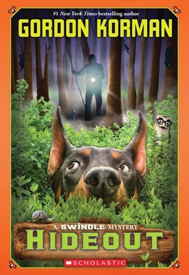 Paperback of Hideout (Swindle #5) by Scholastic Paperbacks showing the book cover with colorful illustrations and title text.