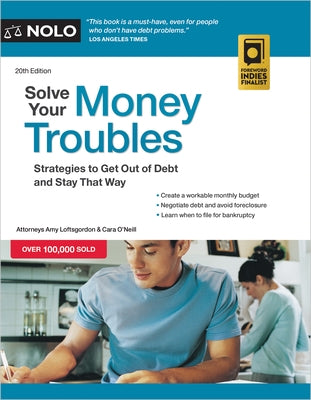 Paperback book titled "Solve Your Money Troubles" by NOLO, featuring a cover with financial and debt management themes.
