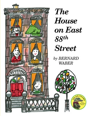 Paperback copy of "The House on East 88th Street" by Clarion Books, featuring the book cover with colorful illustrations.