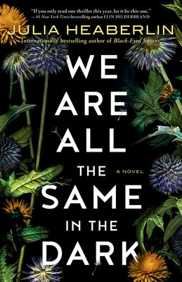 Paperback of "We Are All the Same in the Dark" by Ballantine Books, showing the book cover with dark and moody artwork.