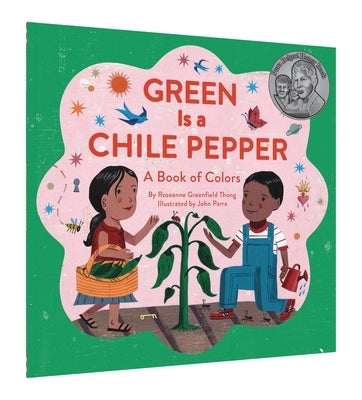Green Is a Chile Pepper paperback book by Chronicle Books, featuring colorful illustrations of a chile pepper on the cover.