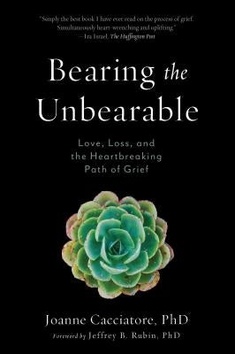 Paperback copy of "Bearing the Unbearable" by Wisdom Publications, featuring a contemplative cover design on a light background.