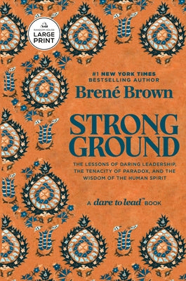Paperback of "Strong Ground" by Random House Large Print Publishing featuring the book cover with bold title text and large print format.