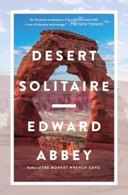 Paperback copy of Desert Solitaire by Touchstone Books, showing the book cover with desert landscape and title text.