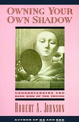 Paperback of "Owning Your Own Shadow" by HarperOne, showing the front cover with dark and light abstract design.