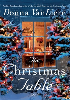 Paperback copy of The Christmas Table by St. Martin's Griffin, featuring holiday-themed cover art and festive design.