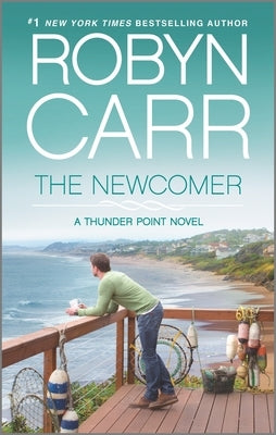 Cover image of "The Newcomer" mass market paperback novel by Mira Books with abstract artwork and bold lettering.