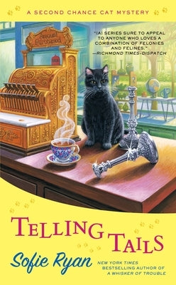 Cover of Telling Tails mass market paperback by Berkley Books featuring a colorful illustrated dog and cat on the front.