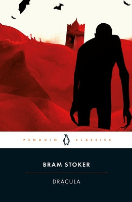 Paperback Dracula by Penguin Classics featuring a dark, atmospheric cover with gothic artwork and classic horror imagery.
