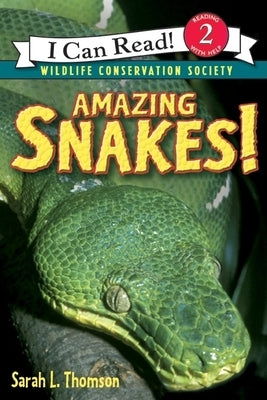 Paperback book titled "Amazing Snakes!" by HarperCollins featuring colorful snake illustrations on the cover.