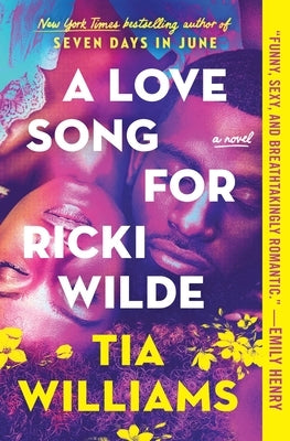 Paperback copy of "A Love Song for Ricki Wilde" by Grand Central Publishing, featuring the book cover with title and author details.