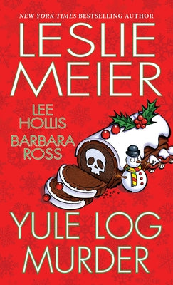 Mass market paperback of Yule Log Murder by Kensington Publishing, showing the book cover with winter holiday imagery.