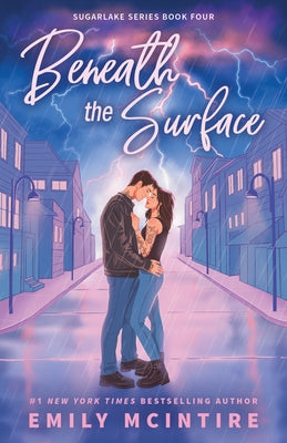Paperback copy of Beneath the Surface by Bloom Books, featuring the book cover with ocean-themed artwork.