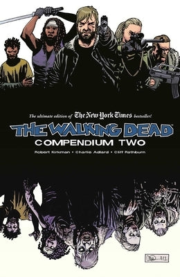 Paperback of The Walking Dead Compendium Volume 2 by Image Comics, featuring cover art with zombie illustrations.