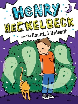 Paperback copy of "Henry Heckelbeck and the Haunted Hideout" by Little Simon featuring colorful cover art and spooky illustrations.