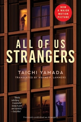 Paperback copy of "All of Us Strangers" movie tie-in book by Mariner Books, showing the cover with title and artwork.