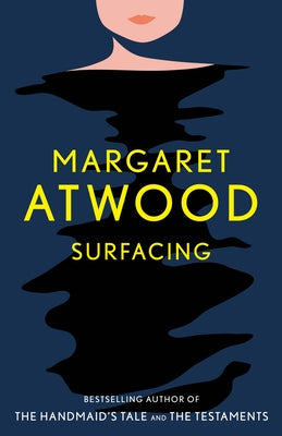 Vintage Surfacing paperback book with a textured cover, featuring bold typography and abstract artwork on the front.