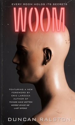 Paperback book titled "Woom" by Shadow Work Publishing, featuring a cover with abstract artwork and bold typography.