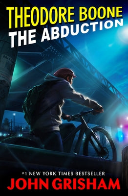 Paperback of Theodore Boone: The Abduction by Puffin Books, showing the book cover with title and author details.