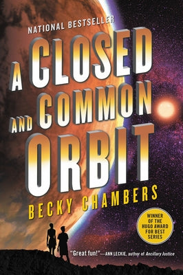 Paperback of "A Closed and Common Orbit" by Harper Voyager featuring a dark cover with artwork and title text.