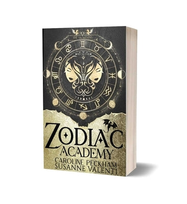 Paperback of Zodiac Academy 1: The Awakening by King's Hollow featuring a dark fantasy cover with mystical symbols.