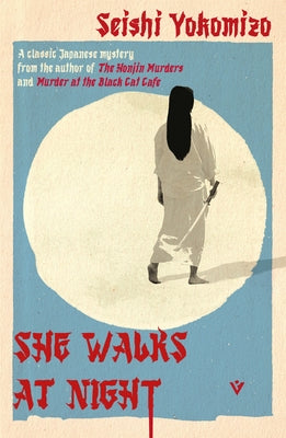 Paperback of She Walks at Night by Pushkin Vertigo, showing the book cover with dark, artistic design and title text.
