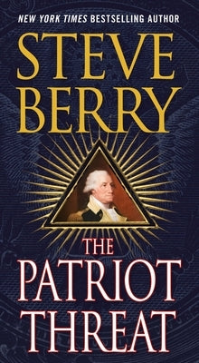 Mass market paperback of The Patriot Threat by Minotaur Books, showing the book cover with bold title and patriotic design.