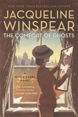 Paperback copy of "The Comfort of Ghosts" novel by Soho Crime, showing the book cover with title and author details.